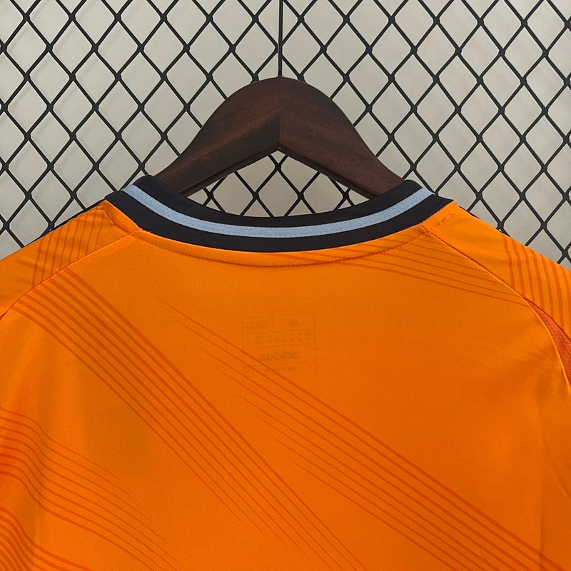 Camisola Real Madrid laranja Away 2024/25